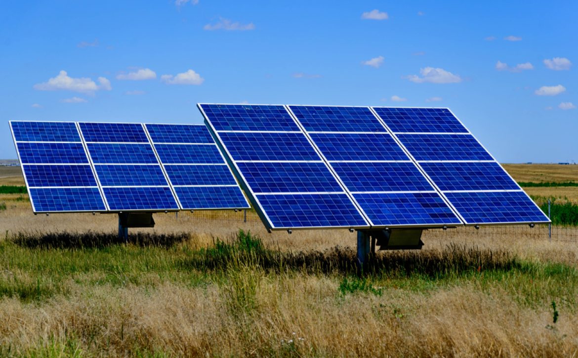 solar panels under a blue sky